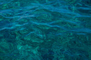 stains in the water from the sun