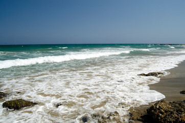 coast and sea, sand beach,  waves, Gouves, Crete, Greece
