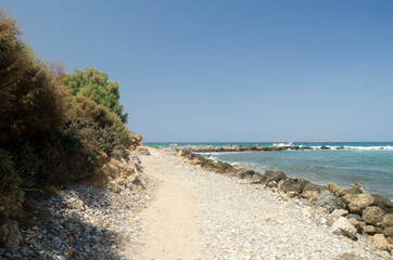 Fototapeta na wymiar coast and sea, waves, Gouves, Crete, Greece
