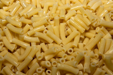 A close up photo of a bunch of cook macaroni pasta