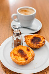 Pastel de nata - Portuguese egg custard tart pastry dusted with cinnamon.
