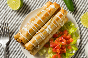 Homemade Mexican Chicken Flautas with Crema