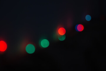  Colored Bokeh Lights On Black Background.Defocused Image Of Illuminated Lights.Boke. 