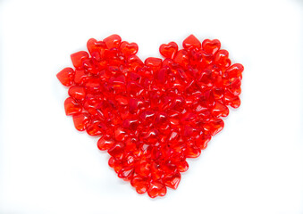 Fototapeta na wymiar Heart made of glass hearts on a white background. Valentine's Day
