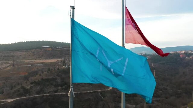 Aerial view of Kayi Tribe flag and Turkish Flag in Bilecik. 4K Footage in Turkey