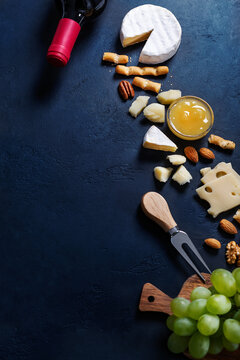 Different sorts of cheese on backround