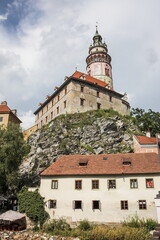 Fototapeta na wymiar Cesky Krumlov Castle with Tower and rafting on Vltava river, Czech Republic