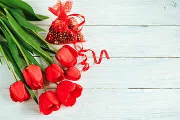 composition with red tulips March 8 greeting card
