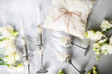 Wedding accessories, candles, ring pillow and wine glasses
