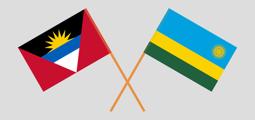 Crossed flags of Antigua and Barbuda and Rwanda