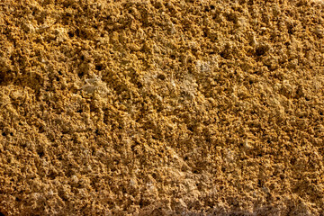 Yellow stone texture close up