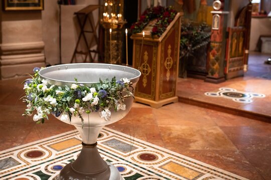 Baptismal font decorated with flowers