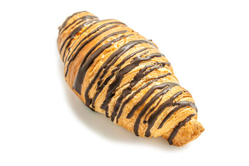 freshly baked flavorful crispy croissant garnished with chocolate isolated on white