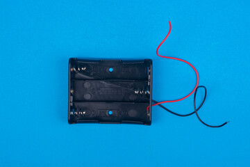 Plastic holder for batteries. View from above.