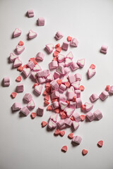 Marshmallows in the shape of a heart on background. Valentines day concept 