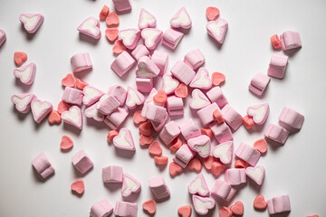 Marshmallows in the shape of a heart on background. Valentines day concept 