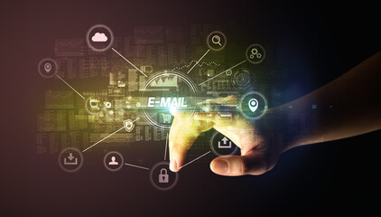 Hand touching E-MAIL inscription, Cybersecurity concept