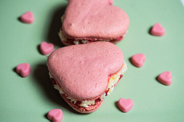 Sweet macaroons in the shape of a heart for Valentine's Day, sweets for Valentine's Day