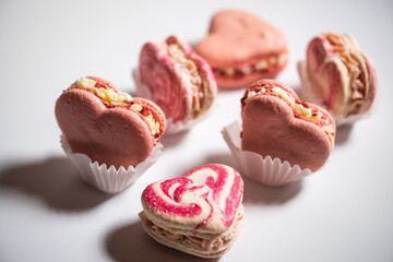 Sweet macaroons in the shape of a heart for Valentine's Day, sweets for Valentine's Day