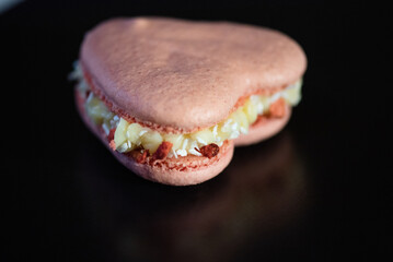 Sweet macaroons in the shape of a heart for Valentine's Day, sweets for Valentine's Day