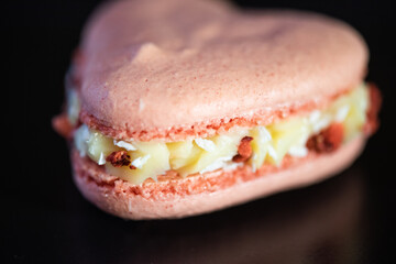 Sweet macaroons in the shape of a heart for Valentine's Day, sweets for Valentine's Day