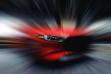 Fototapeta na wymiar High-speed sports car in motion. Motion blur abstract car background.