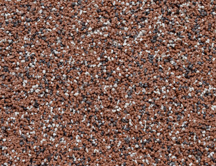 Artificial pebble background on wall