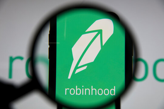 LONDON, UK - January 2021: Robinhood investing app under magnifying glass