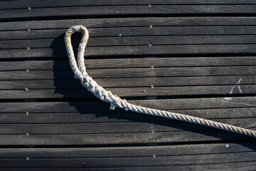 Naklejka premium different knots and ropes on the pier