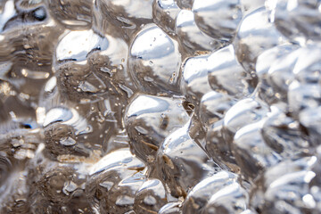 water is a frozen piece of critical ice that shines like a large dim and forms an interesting...