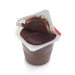 Chocolate pudding in plastic container on white