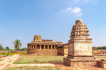 Aihole, Karnataka, India - November 7, 2013: Brown stone Durga Gudi or Temple under blue...