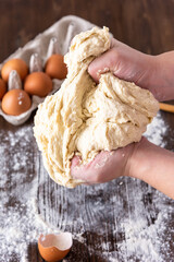 The process of preparing and mixing dough for the preparation of bakery products. Top view.