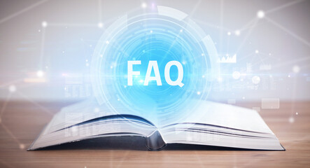 Open book with FAQ abbreviation, modern technology concept