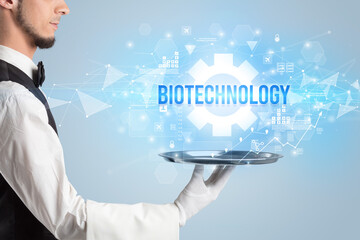 Waiter serving new technology concept with BIOTECHNOLOGY inscription