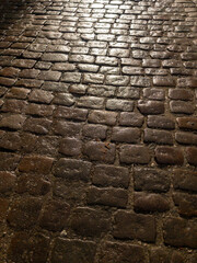 old stone road lit by afternoon light