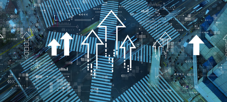 Rising arrow theme with busy city traffic intersection - Powered by Adobe