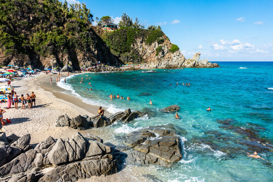 The beautiful Zambrone beach full of tourists an bathers during summertime, Calabria, Italy