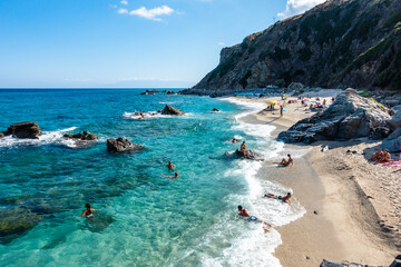 The beautiful Zambrone beach full of tourists an bathers during summertime, Calabria, Italy