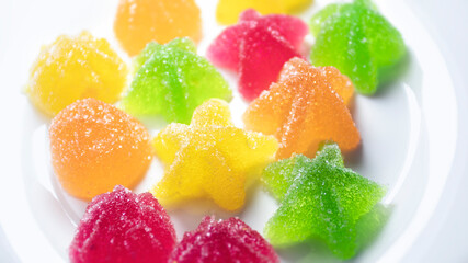 Colored marmalade on a white background. Sweet gummy candy close-up.