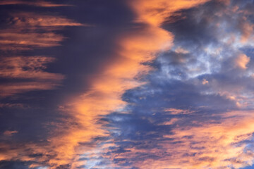 Fototapeta premium Close up of a layer of brightly colored sunset clouds