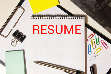 word RESUME on white paper