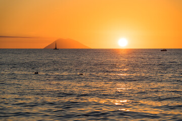 Beautiful sunset over Tyrrhenian Sea and Stromboli island viewed from Tropea, Calabria, Italy