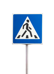 Blue pedestrian crossing sign at road intersection