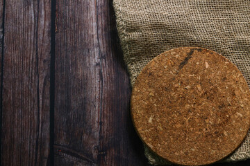 Simple and dark mood of a wooden table for background purposes.