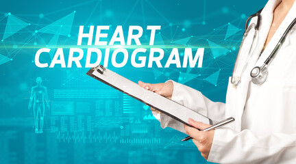 doctor writes notes on the clipboard with HEART CARDIOGRAM inscription, medical diagnosis concept