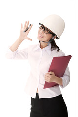 Business woman wearing a safety helmet
