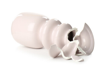 Broken pink ceramic vase isolated on white