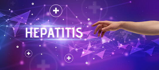 Close-Up of cropped hand pointing at HEPATITIS inscription, medical concept