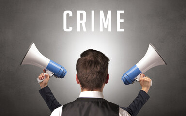 Rear view of a businessman with CRIME inscription, cyber security concept